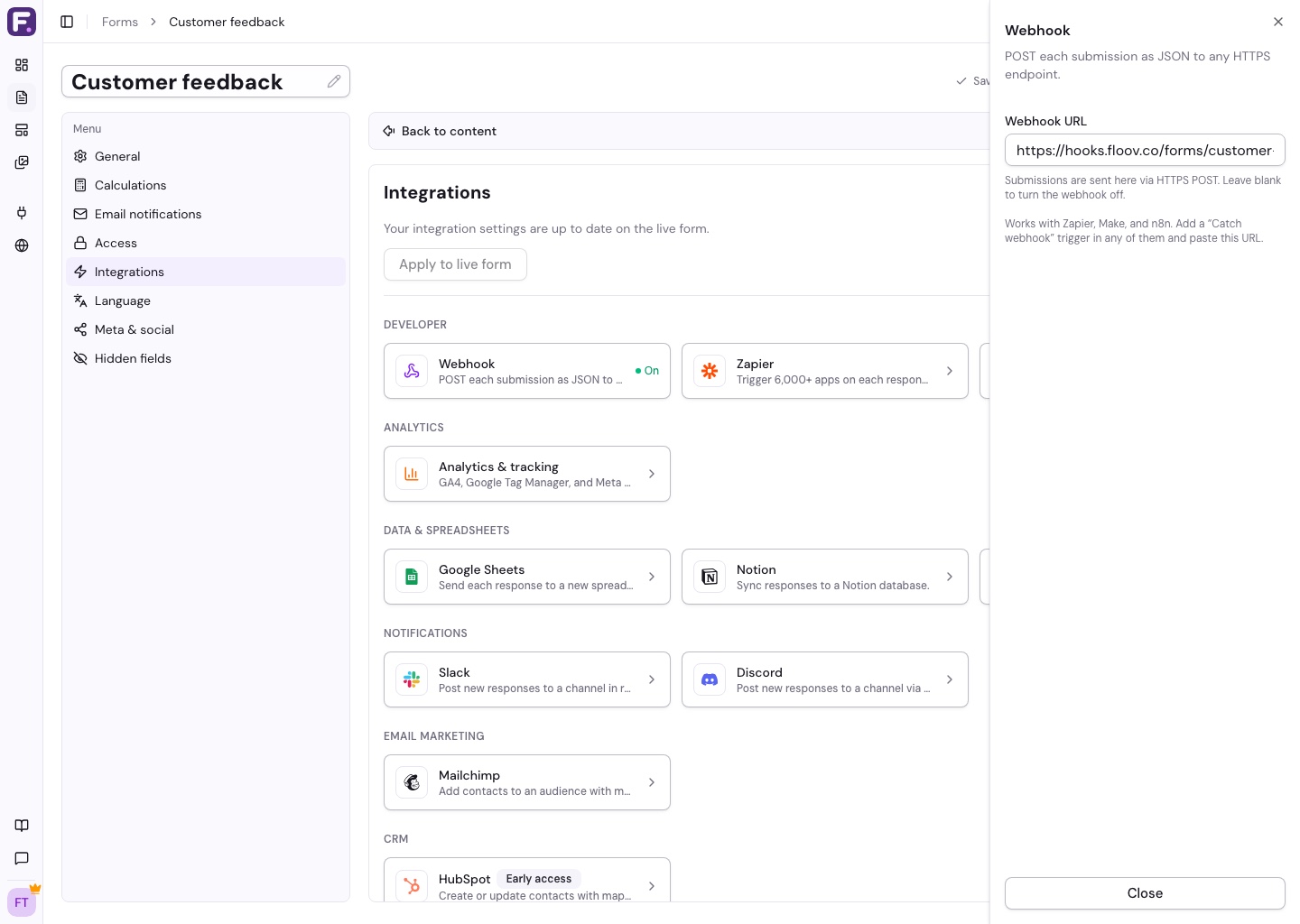 Integrations settings showing the webhook toggle and URL input